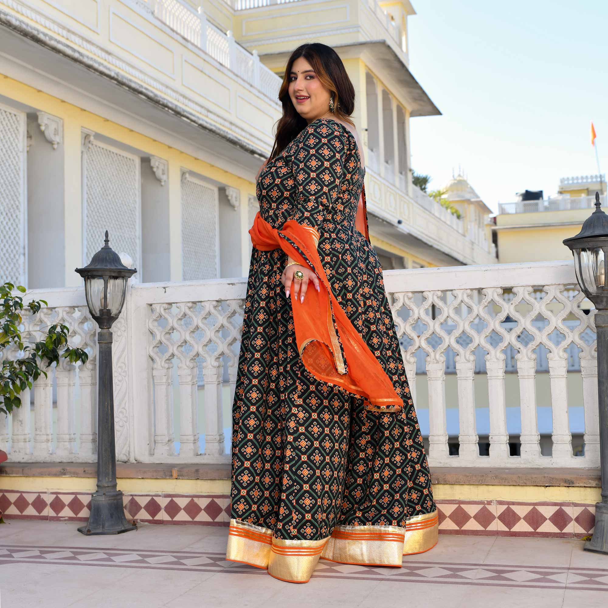 Madhuban- Patola Black with Orange Anarkali