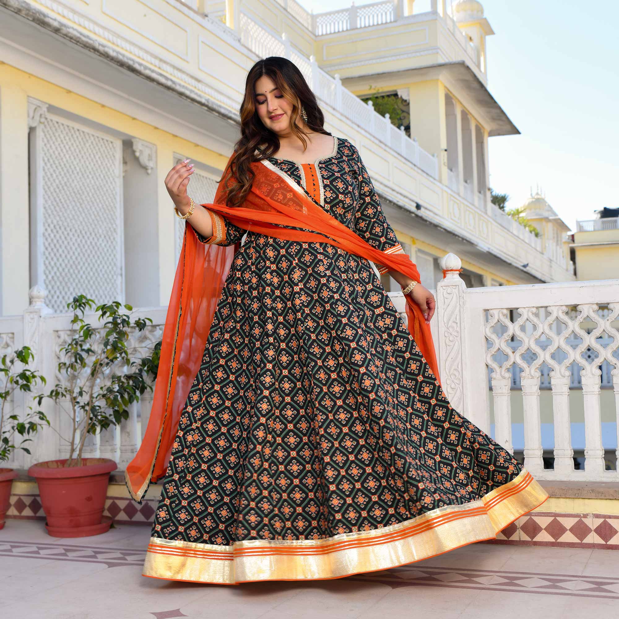 Madhuban- Patola Black with Orange Anarkali