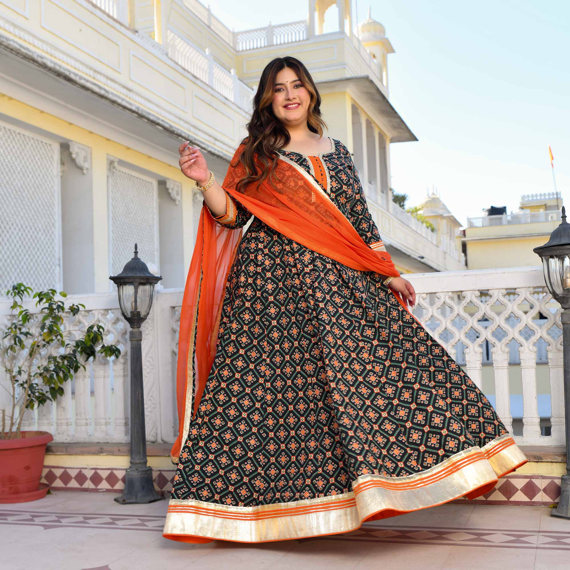 Madhuban- Patola Black with Orange Anarkali