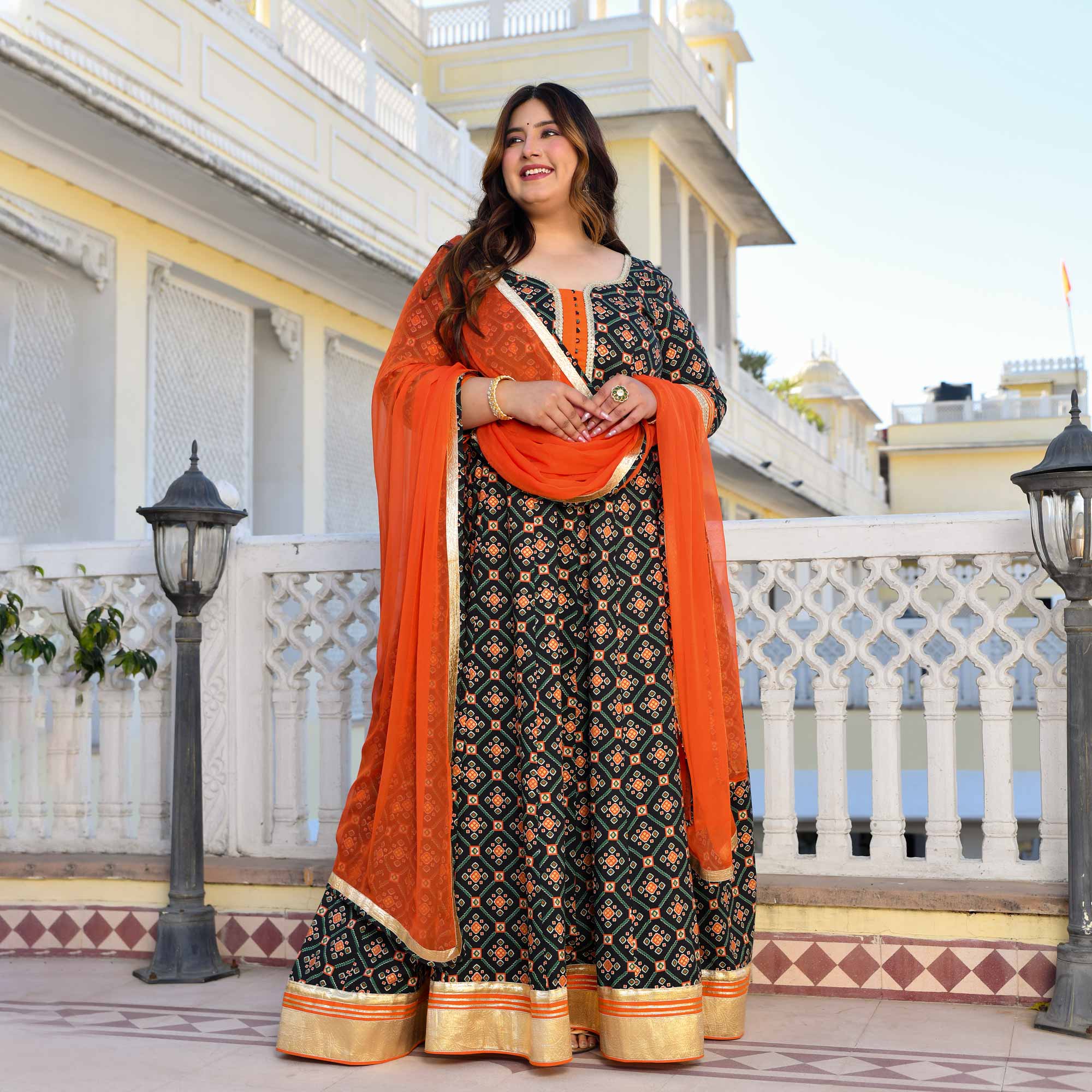 Madhuban- Patola Black with Orange Anarkali