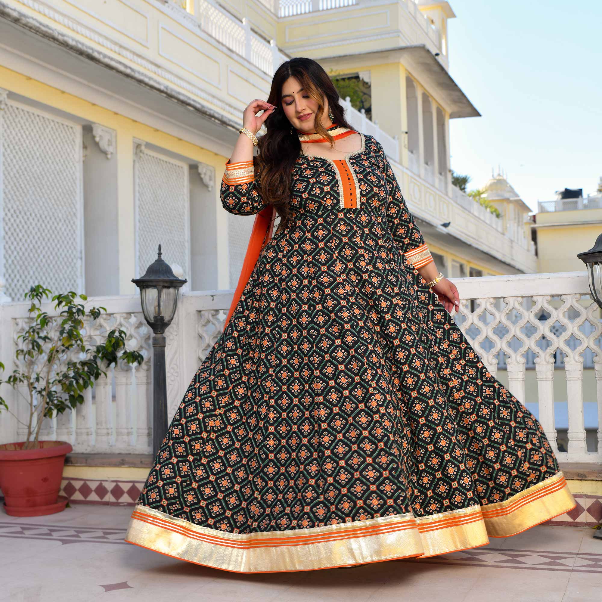 Madhuban- Patola Black with Orange Anarkali