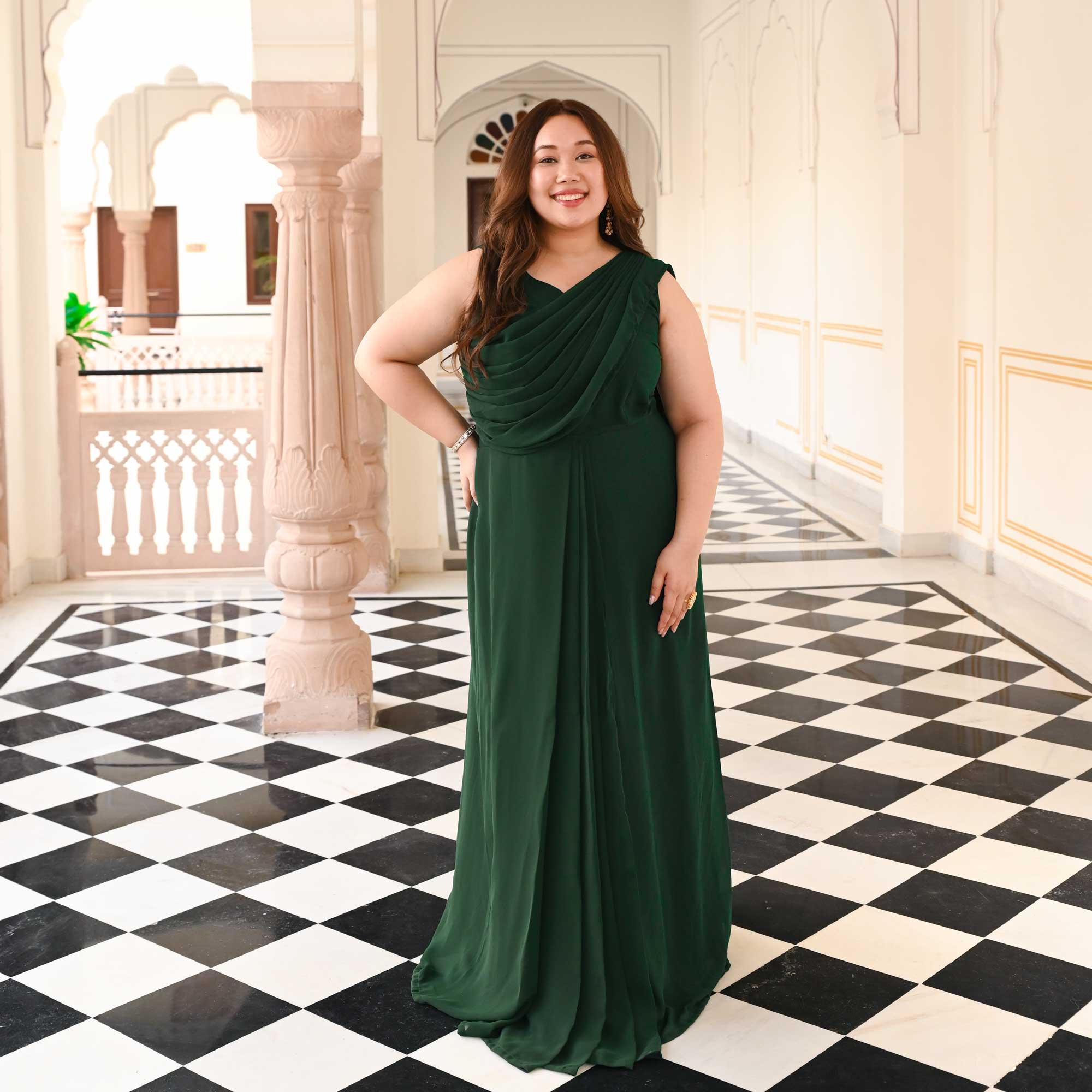 Woman Posing in an Elegant Saree Dress and Jewelry · Free Stock Photo